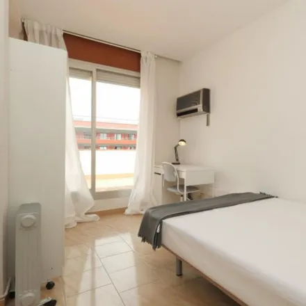 Rent this 6 bed room on Carrer de Caballero in 10, 08001 Barcelona