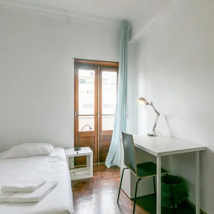 Rent this 4 bed room on Restaurante Santo António in Rua de Almada 34, 2825-450 Costa da Caparica