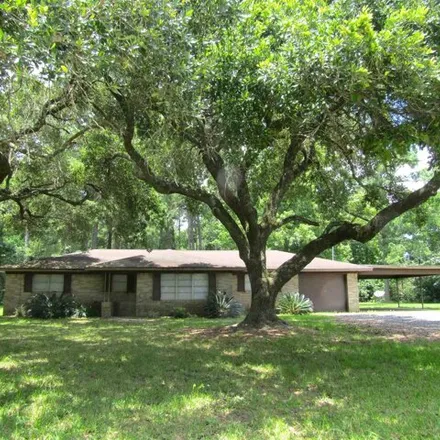 Rent this 3 bed house on 144 Mansfield Ferry Road in Vidor, TX 77662
