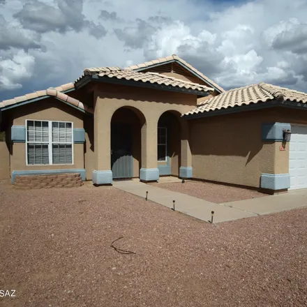 Rent this 4 bed house on 7301 West Odyssey Way in Marana, AZ 85743