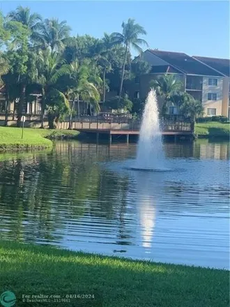 Buy this 2 bed condo on Riverside Drive in Coral Springs, FL 33071