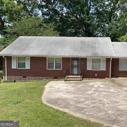 Buy this 4 bed house on 2203 2nd Avenue in Candler-McAfee, GA 30032