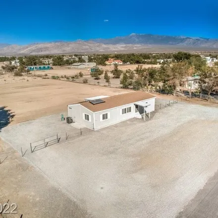 Buy this 3 bed house on 4530 Pawnee Place in Pahrump, NV 89061