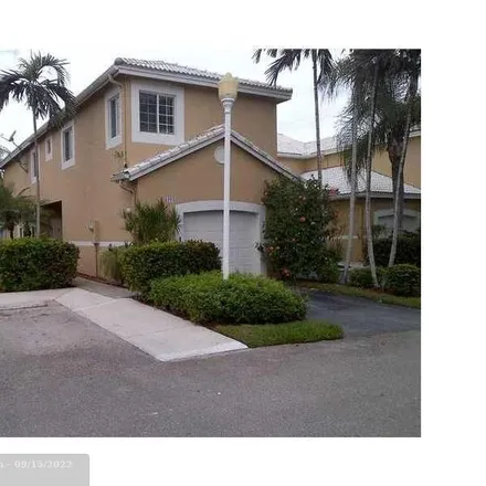 Rent this 4 bed townhouse on Salerno Circle in Weston, FL