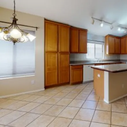 Rent this 4 bed apartment on 645 West Redwood Drive in Fox Crossing, Chandler
