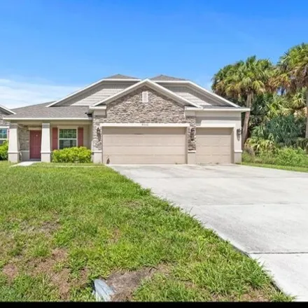 Buy this 4 bed house on 4026 Southwest McCandless Street in Port Saint Lucie, FL 34953