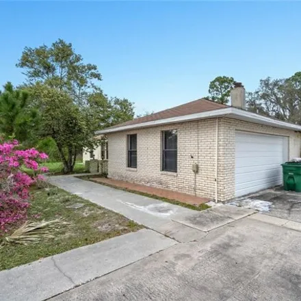Buy this 5 bed house on 2310 Howland Boulevard in Deltona, FL 32738