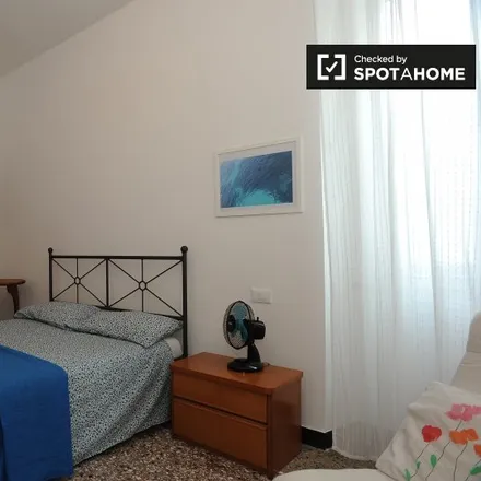 Rent this 2 bed room on Via Giuseppe Ghislieri in 11, 00152 Rome RM