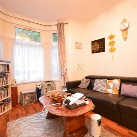 Buy this 4 bed townhouse on 36 Harcourt Avenue in London, E12 6DG