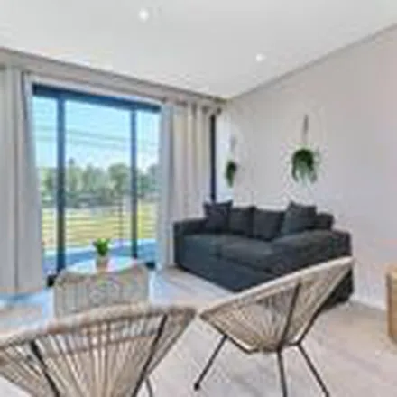 Rent this 2 bed apartment on Braamfontein Spruit Trail in Hurlingham Gardens, Sandton