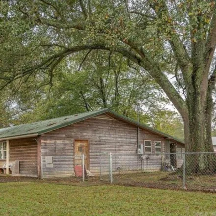 Buy this 3 bed house on 1913 Smith Avenue in Mena, AR 71953