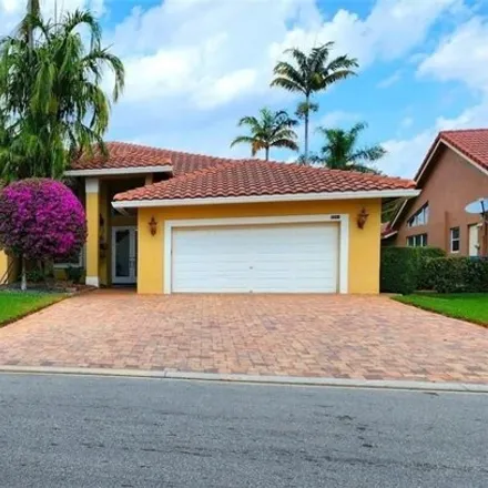 Rent this 4 bed house on 4927 Northwest 99th Terrace in Coral Springs, FL 33076