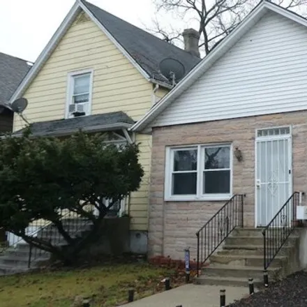 Buy this 3 bed house on 7522 South Merrill Avenue in Chicago, IL 60649