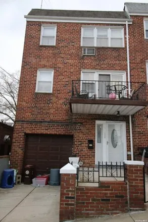 Buy this 8 bed house on 163-16 65th Ave in Flushing, New York