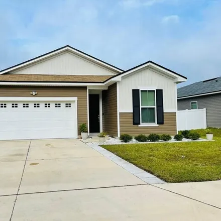 Rent this 3 bed house on Thatcher Lane in Jacksonville, FL 32222