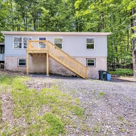 Buy this 3 bed house on 235 Tomahawk Road in Paupack Township, PA 18436