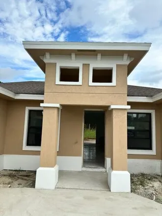 Buy this 3 bed house on 6147 Gatun Drive in Port Saint Lucie, FL 34986