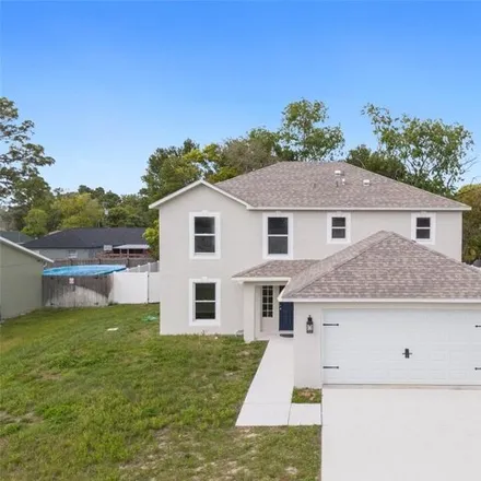 Buy this 4 bed house on 11281 Addison Street in Spring Hill, FL 34609