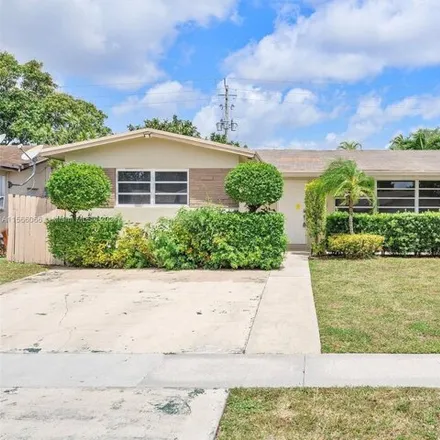 Buy this 3 bed house on 4359 Harrison Street in Hollywood, FL 33021