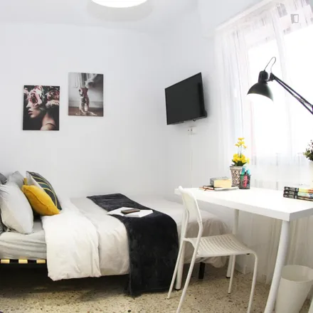 Rent this 5 bed room on Calle de Camarena in 229, 28047 Madrid