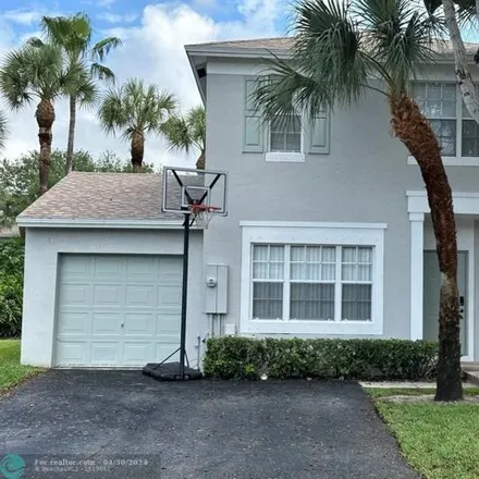 Rent this 3 bed house on 9499 Stanley Lane in Tamarac, FL 33321