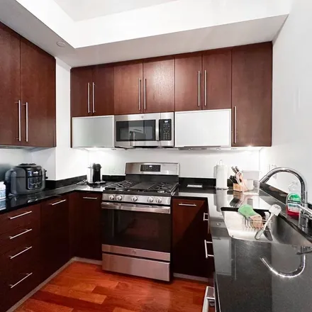 Rent this 1 bed apartment on J Condos in 136 Front Street, New York