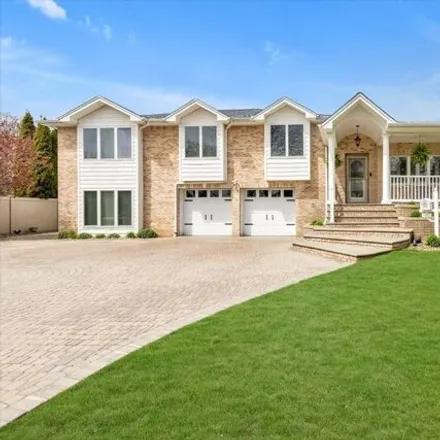 Buy this 5 bed house on 2 Dovecote Lane in Commack, NY 11725