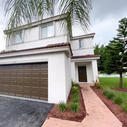 Rent this 4 bed house on 1357 Majesty Terrace in Weston, FL 33327