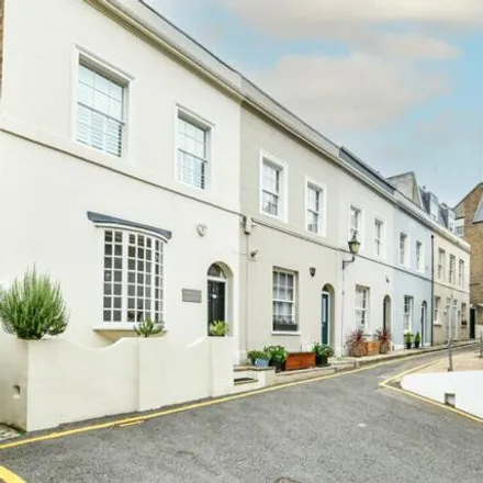 Buy this 3 bed townhouse on 8 Gregory Place in London, W8 4NG