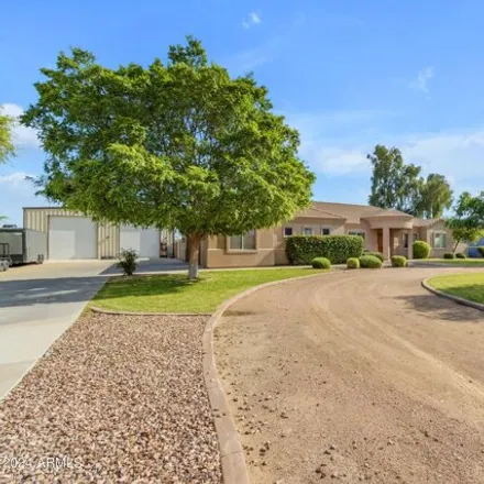 Buy this 4 bed house on 1754 East Paint Horse Place in San Tan Valley, AZ 85140