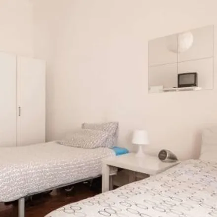 Rent this 4 bed room on Rua Carlos Mardel 62 in 1900-183 Lisbon, Portugal