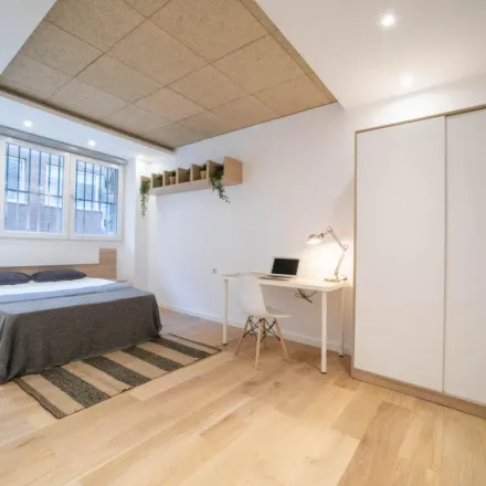 Rent this 7 bed apartment on Calle de Guzmán el Bueno in 70, 28015 Madrid