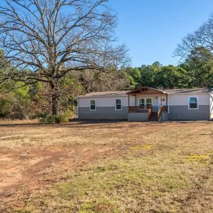 Buy this studio apartment on 708 Law Road in Harrison County, TX 75651