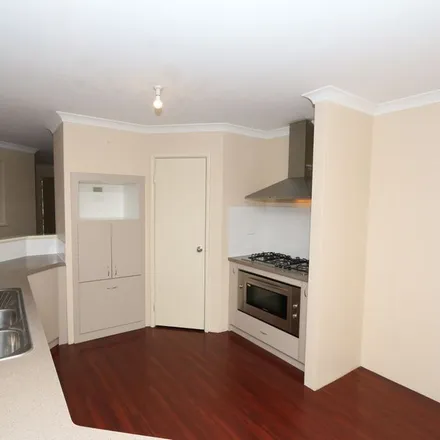 Rent this 4 bed apartment on Dravite Way in Dalyellup WA, Australia