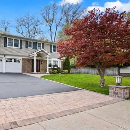 Buy this 4 bed house on 37 Tulipwood Drive in Commack, NY 11725