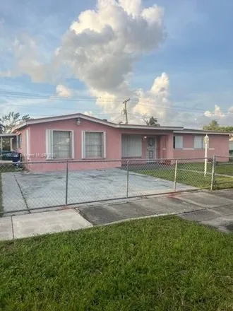 Rent this 4 bed house on 5281 Northwest 180th Terrace in Miami-Dade County, FL 33055