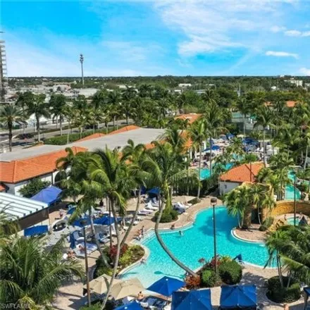 Buy this 2 bed condo on The Cottages at Naples Bay Resort in Tamiami Trail, East Naples