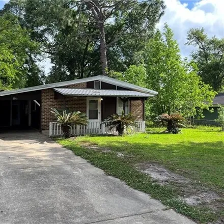Rent this 3 bed house on 360 West Lee Street in Chickasaw, Mobile County