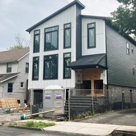 Buy this 6 bed house on 54 North 21st Street in Ampere, East Orange