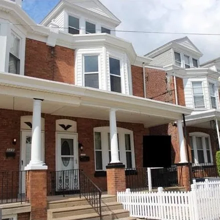 Rent this 5 bed townhouse on 4432 Mitchell Street in Philadelphia, PA 19128