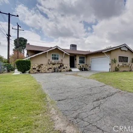 Buy this 4 bed house on 1711 West 20th Street in San Bernardino, CA 92411