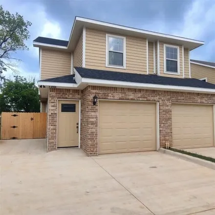 Rent this 3 bed house on 1619 Ash Crescent Street in Fort Worth, TX 76104