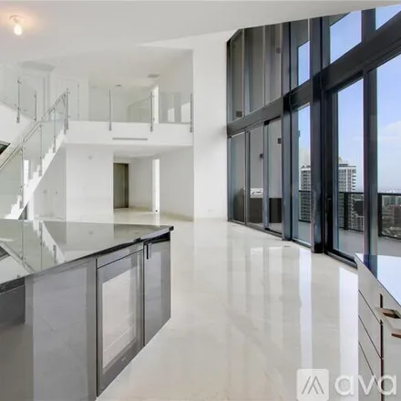 Rent this 3 bed duplex on 18555 Collins Ave