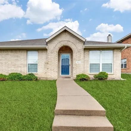 Rent this 4 bed house on 1611 Venus Dr E in Lancaster, Texas