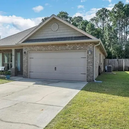 Rent this 3 bed house on 1018 Cocobolo Drive in Santa Rosa Beach, FL 32459