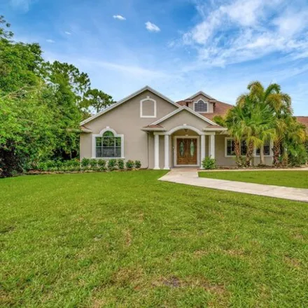 Buy this 4 bed house on 16181 81st Ln N in Loxahatchee, Florida