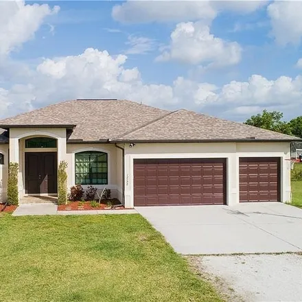 Buy this 3 bed house on 11988 Homestead Lane in Lee County, FL 33905