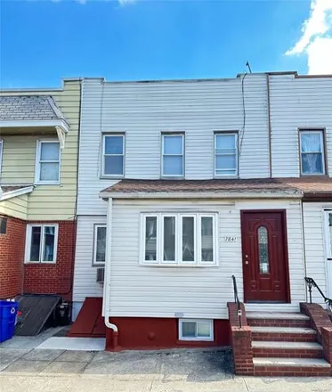 Buy this 3 bed house on 78-41 74th Street in New York, NY 11385