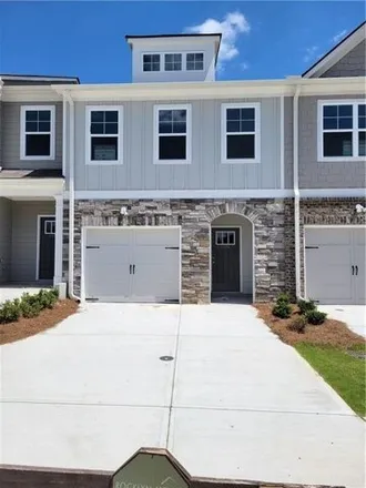 Rent this 3 bed townhouse on Scudders Drive in Stonecrest, GA 30058