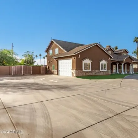 Buy this 9 bed house on Sun Valley High School in 1143 South Lindsay Road, Mesa